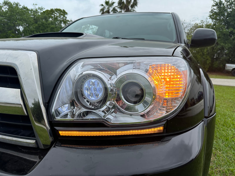 Load image into Gallery viewer, 06-09 4th Gen 4Runner LED Turn Signal Filler Panels w/ DRL - SRQ Fabrications
