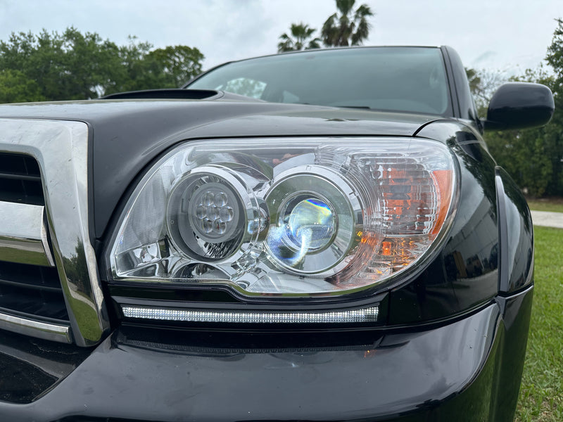 Load image into Gallery viewer, 06-09 4th Gen 4Runner LED Turn Signal Filler Panels w/ DRL - SRQ Fabrications
