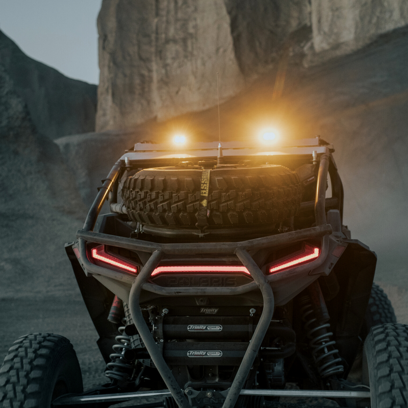 Load image into Gallery viewer, heretics ba-2 pob light being used as a chase light on a can-am maverick
