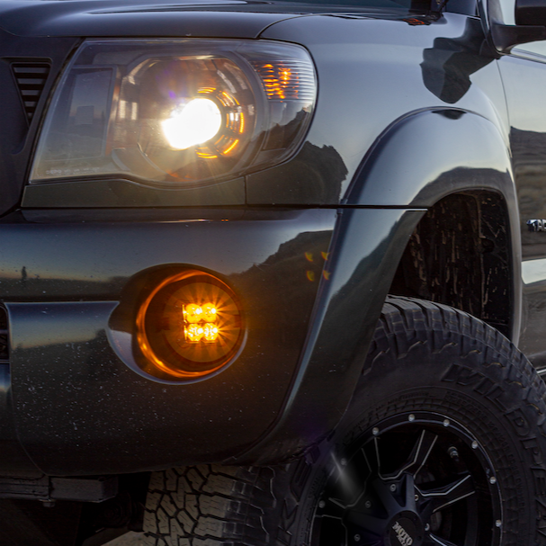 Load image into Gallery viewer, amber led fog light kit mounted on a toyota tacoma
